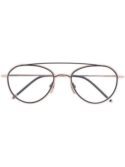 Shop Thom Browne Eyewear Round Frame Glasses - Metallic