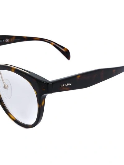 Shop Prada Eyewear Round Tortoiseshell Glasses - Brown
