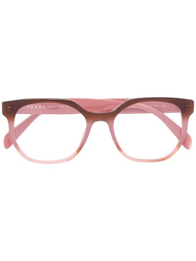 Shop Prada Eyewear Two Tone Rounded Frame Glasses - Pink