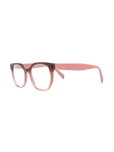 Shop Prada Eyewear Two Tone Rounded Frame Glasses - Pink