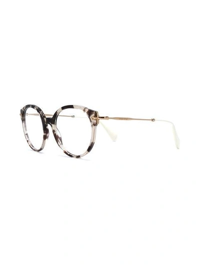 Shop Miu Miu Eyewear Tortoiseshell Glasses - Brown
