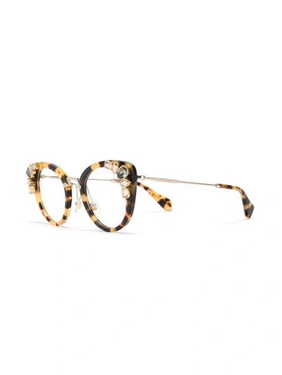 Shop Miu Miu Tortoiseshell Eye Cat Glasses In Brown