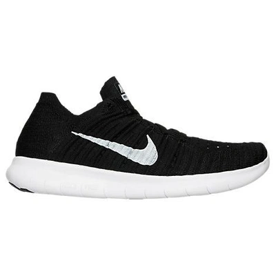 Shop Nike Women's Free Rn Flyknit Running Shoes, Black