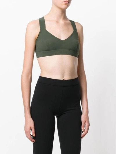 Shop No Ka'oi Crisscross Strap Sports Bra In Green