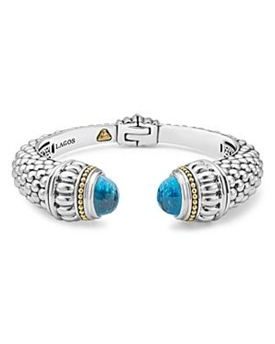 Shop Lagos 18k Gold And Sterling Silver Caviar Color Swiss Blue Topaz Cuff, 14mm In Blue/silver