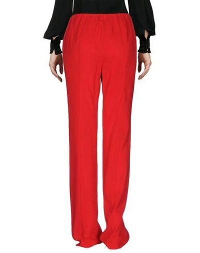 Shop Donna Karan Casual Pants In Red