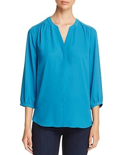 Shop Nydj Pintuck Back Blouse In Tuscan Teal