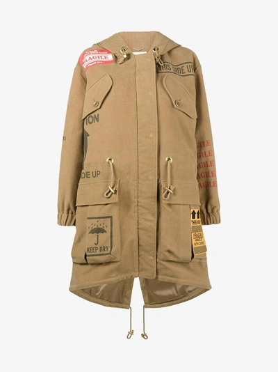 Shop Moschino Printed Oversized Hooded Parka In Nude/neutrals