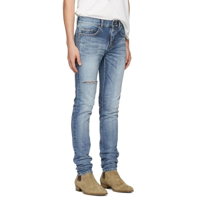 Shop Saint Laurent Blue Ripped Low-waisted Skinny Jeans In 4302 Dirty Medium Bl