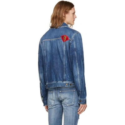 Shop Saint Laurent Blue Distressed Patches Denim Jacket