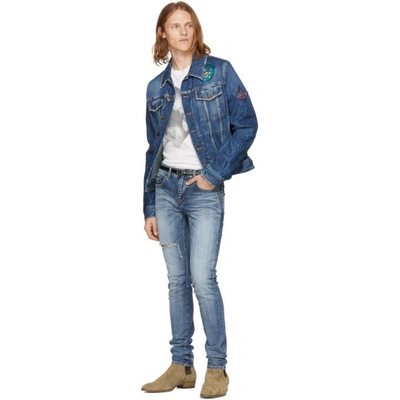 Shop Saint Laurent Blue Distressed Patches Denim Jacket