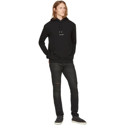 Shop Saint Laurent Black Holes Low-waisted Skinny Jeans In 1505 Medium Black