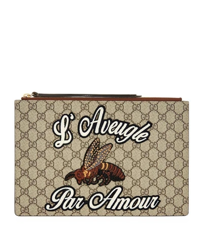 Shop Gucci Gg Supreme Bee Pouch In Beige