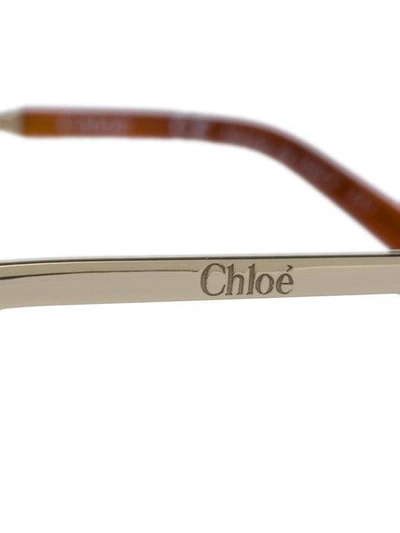 Shop Chloé Metal Frame Sunglasses In Metallic