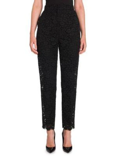 Shop Dolce & Gabbana Floral Lace Trousers In Black