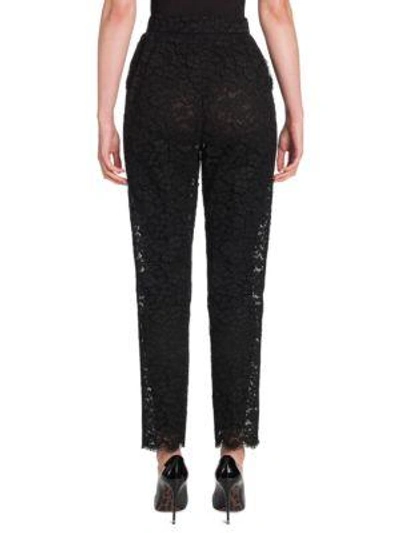 Shop Dolce & Gabbana Floral Lace Pants In Black