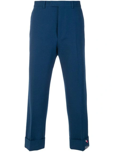 Shop Gucci Embroidered Ankle Cropped Trousers - Blue