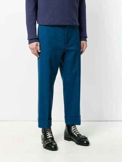 Shop Gucci Embroidered Ankle Cropped Trousers - Blue