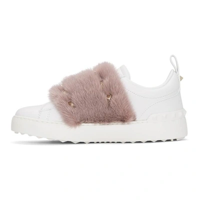 Shop Valentino White & Pink  Garavani Fur Laceless Rockstud Sneakers