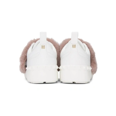 Shop Valentino White & Pink  Garavani Fur Laceless Rockstud Sneakers