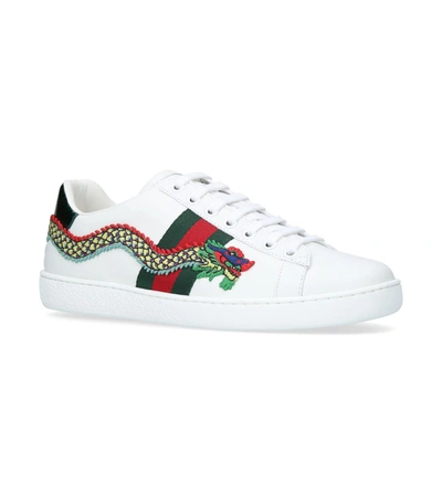 Shop Gucci New Ace Dragon Trainers In White