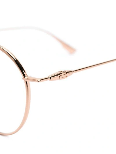 Shop Dior Round Frame Glasses In Metallic