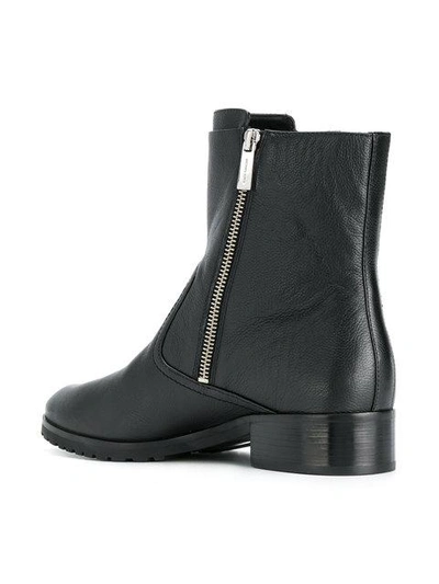 Shop Michael Michael Kors Ankle Zip Boots In Black