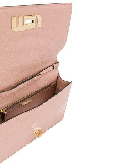 Shop Miu Miu Crystal Embellished Crossbody Bag - Pink