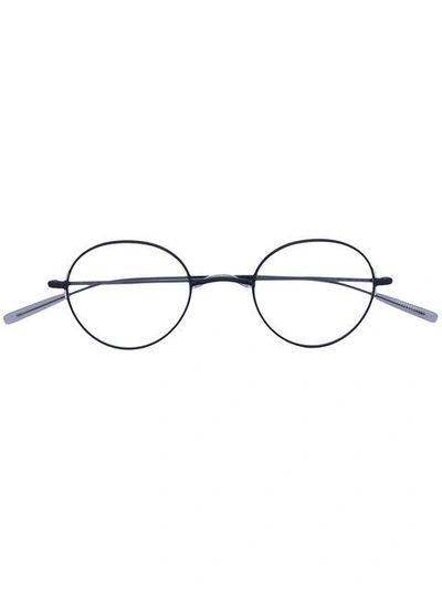 Shop Eyevan7285 Round Frame Glasses