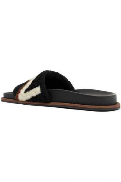 Shop Fendi Logo-print Shearling Slides In Black