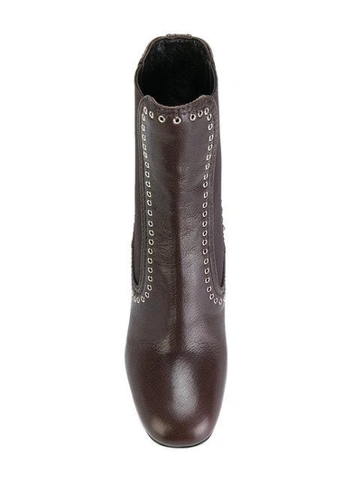Shop Miu Miu Eyelet Detail Ankle Boots In Brown