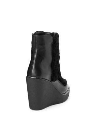 Shop Aquatalia Violett Shearling & Leather Wedge Booties In Black
