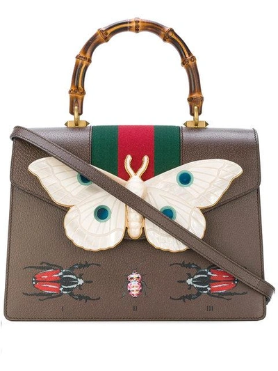 Shop Gucci Leather Top Handle Bag With Moth