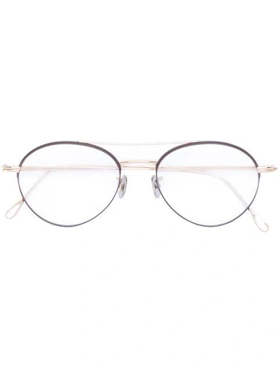 Shop Eyevan7285 Round Glasses