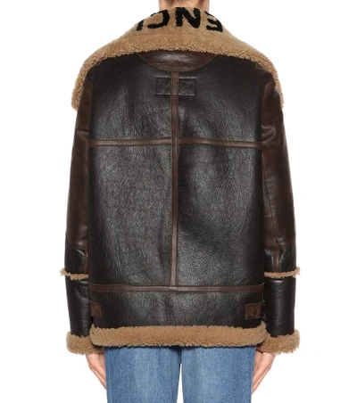 Shop Balenciaga The Bombardier Shearling Jacket In Brown