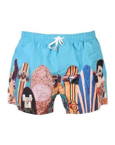 Shop Dsquared2 Swim Trunks In Turquoise