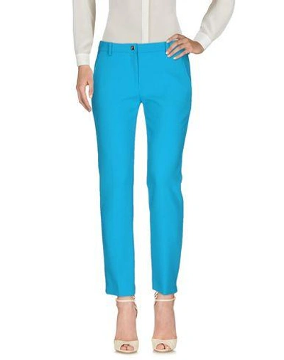 Shop Versace Casual Pants In Turquoise
