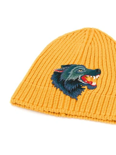 Shop Gucci Knitted Wolf Beanie - Yellow