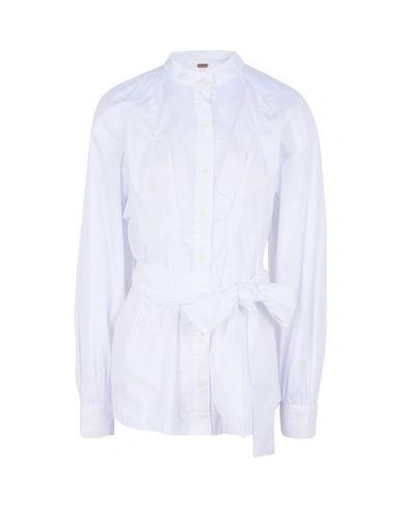 Shop Free People Solid Color Shirts & Blouses In White