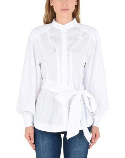 Shop Free People Solid Color Shirts & Blouses In White