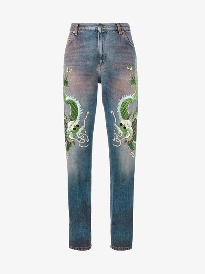 Shop Gucci Embroidered Dragon Jeans In Blue