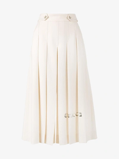 Shop Gucci Pleated Bermuda Trousers In Beige