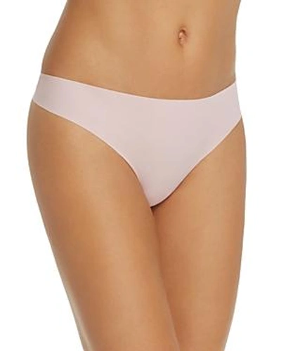 Shop Calvin Klein Invisibles Thong In Connected Pink
