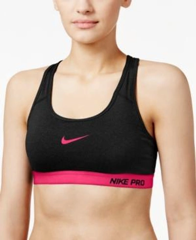 Shop Nike Pro Padded Mid-impact Sports Bra In Black/racer Pink