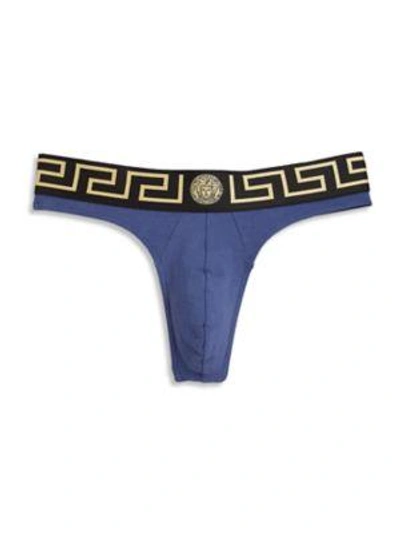Shop Versace Iconic Logo Thong In Blue