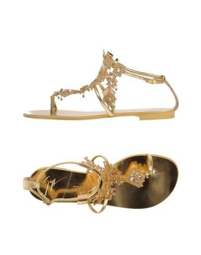 Shop Giuseppe Zanotti Toe Strap Sandals In Gold