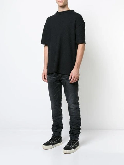 Shop John Elliott Stonewashed Slim-fit Jeans