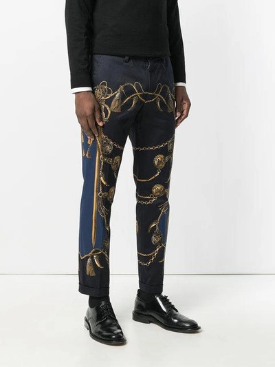 Shop Dolce & Gabbana Military Print Cropped Trousers