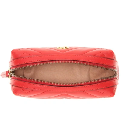 Shop Gucci Gg Marmont Matelassé Leather Pouch In Red