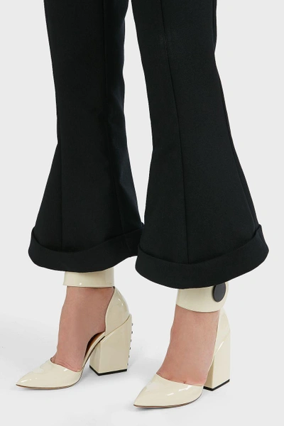 Shop Jacquemus Flared Wool And Cotton-blend Trousers
